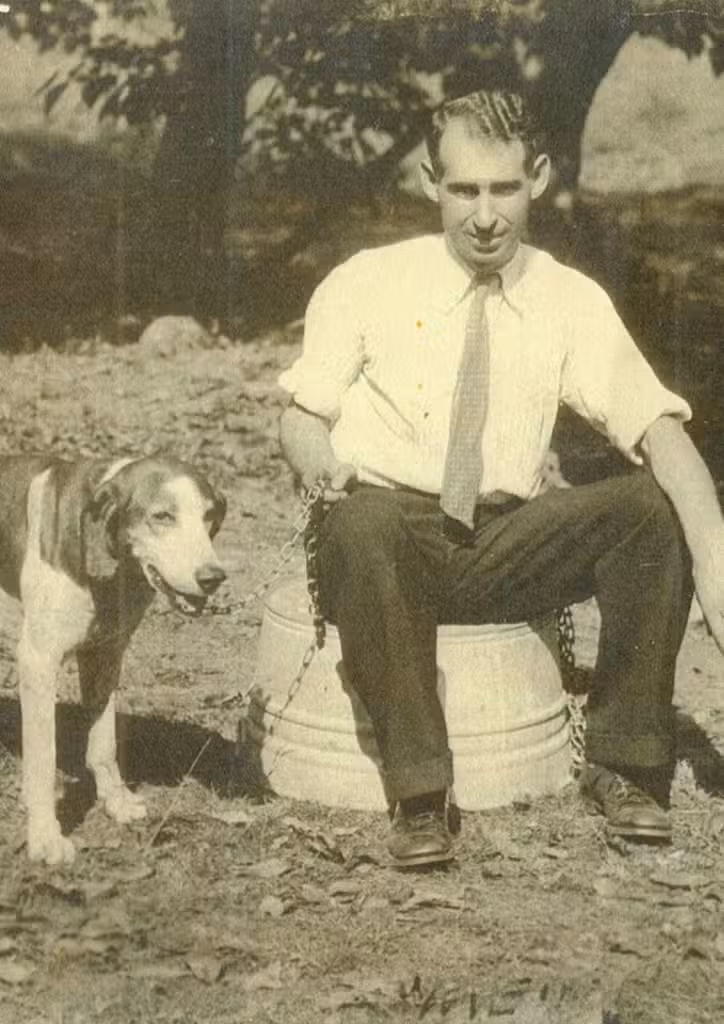 Key Underwood with his coonhound Troop